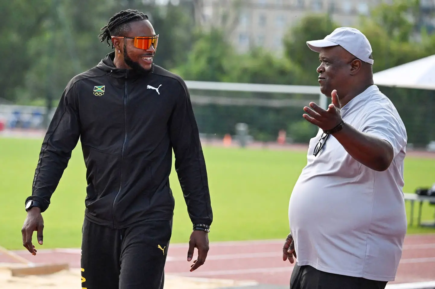 Coach Stephen Francis (right) talks to rising sprint sensation Kishane Thompson during training at Complexe Sportif de L’lle Des Vannes in Paris, France, on Wednesday.Photo: Naphtali Junior