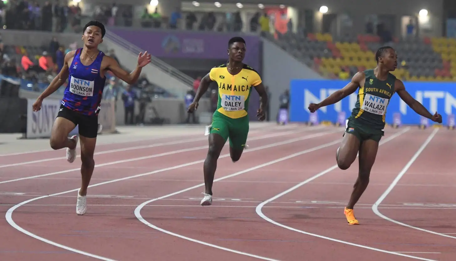 From left: Thailand’s Puripol Bonsoon, Jamaica’s Deandre Daley, and South Africa’s Bayanda Walaza compete in the men’s 100m final during the World Athletics U20 Championships at Estadio Atletico de la Videna in Lima, Peru, on Wednesday.