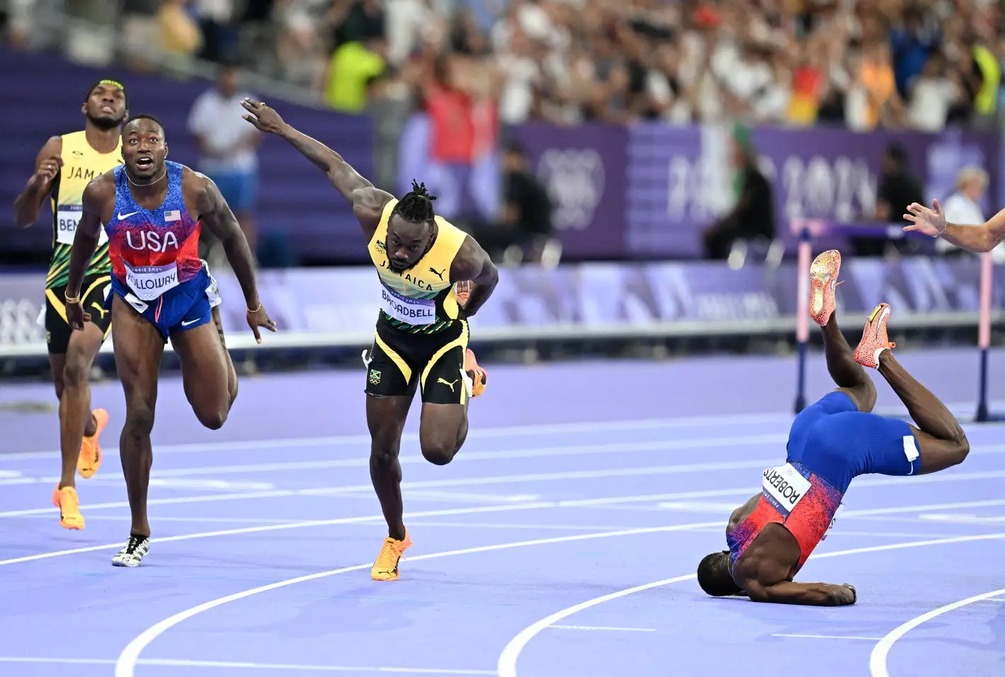 Jamaican sprint hurdler Rasheed Broadbell (centre) dips to claim third place in the final of the 110m hurdles event at the Paris 2024 Olympic Games, clocking 13.09 seconds. American Grant Holloway (left) took the gold medal in 12.99 seconds ahead of Daniel Roberts, 13.09, who loses his footing after dipping at the finish line.