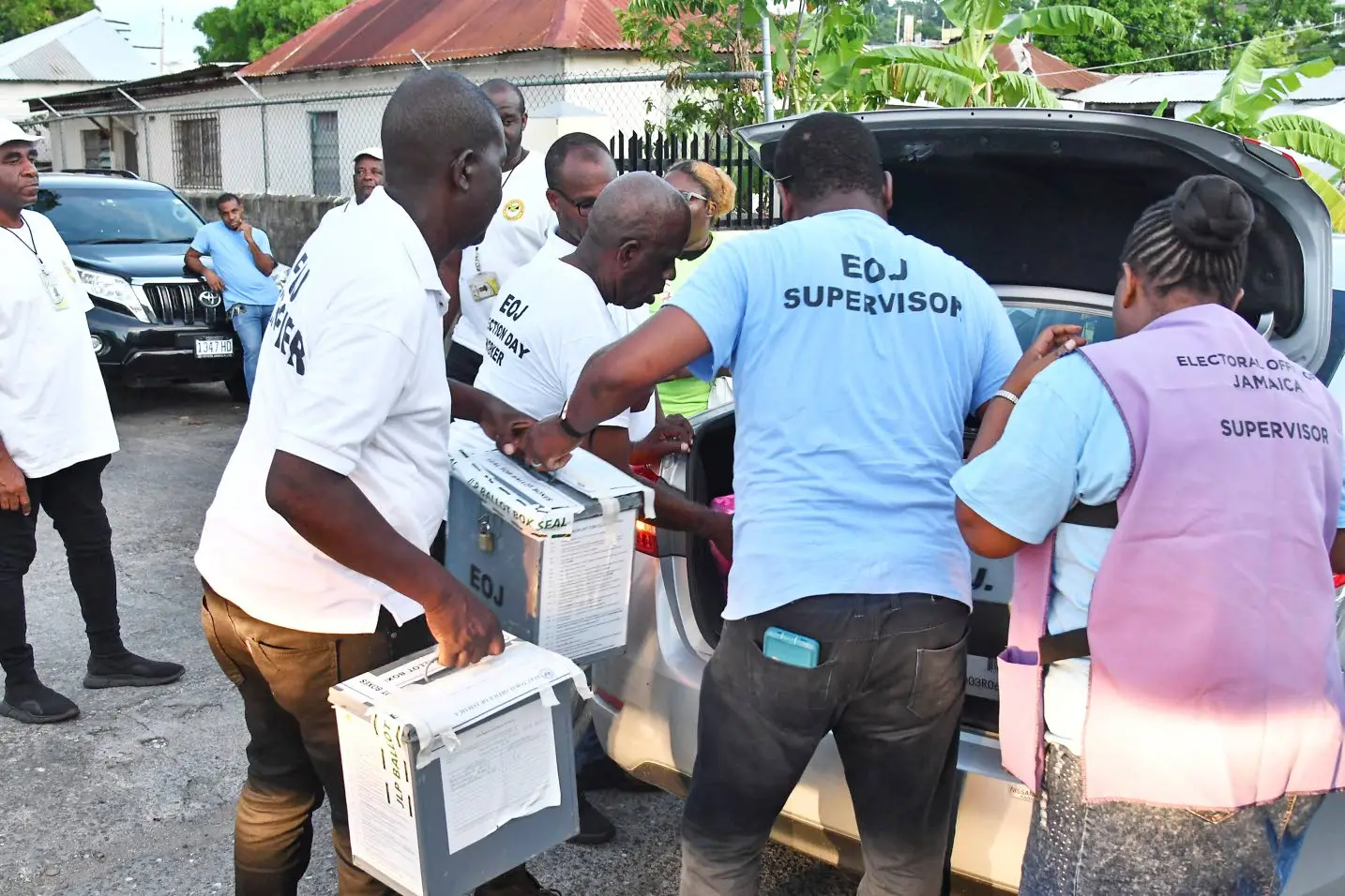 Electoral Office of Jamaica staff collect ballot boxes to take them to the counting centre in Monday’s parliamentary by-election for the St Ann North Eastern constituency.Karl Mclarty