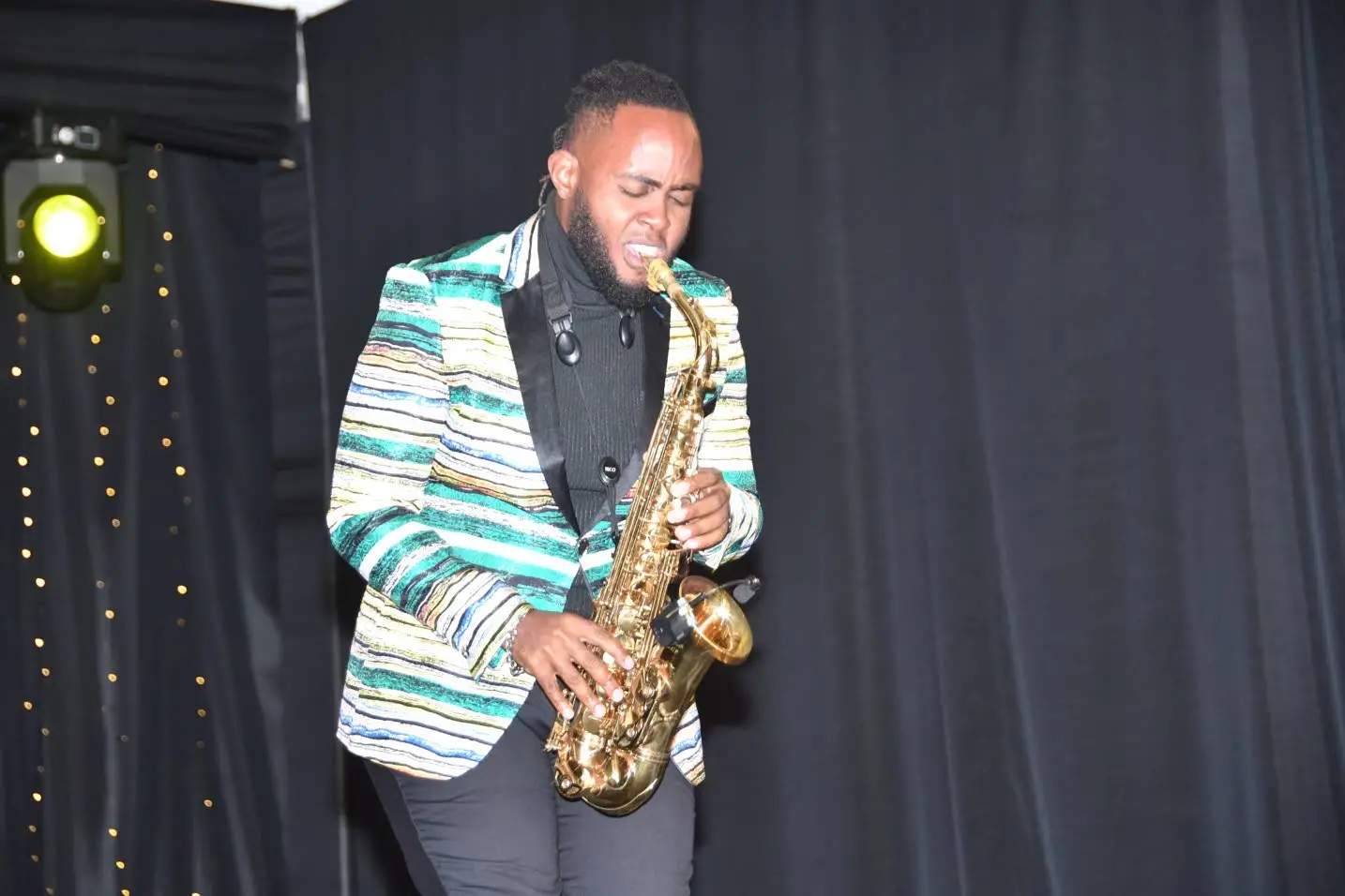 Saxophonist Raheem Vassell thrills the ladies.Garfield Robinson