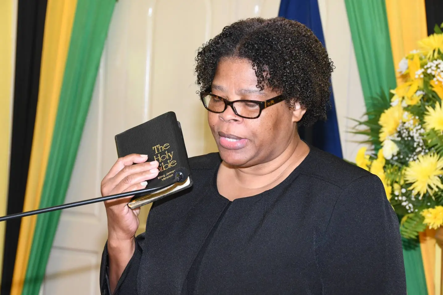 Justice Georgiana Fraser takes the oath of office.