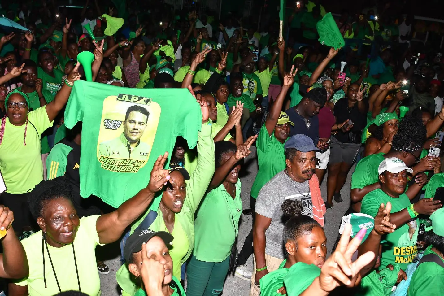 Jubilant Jamaica Labour Party supporters celebrate the victory of their candidate, Matthew Samuda, in St Ann’s Bay Monday evening after the parliamentary by-election for the St Ann North Eastern constituency.Karl Samuda