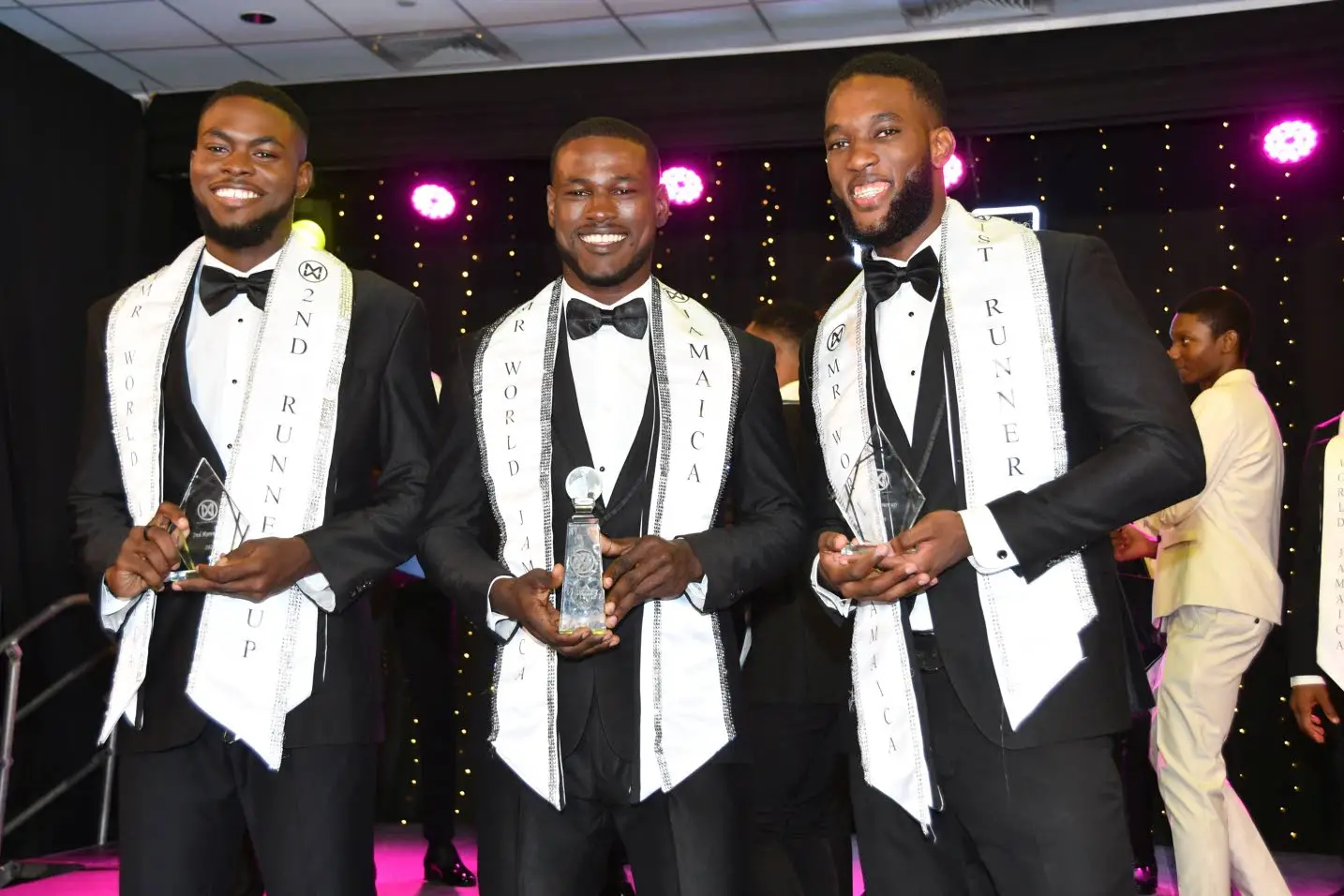 Mr World Jamaica 2024 Tarique Barrett is flanked by first runner-up Tavar Brown (right) and Dario Lopez, who placed third.Garfield Robinson