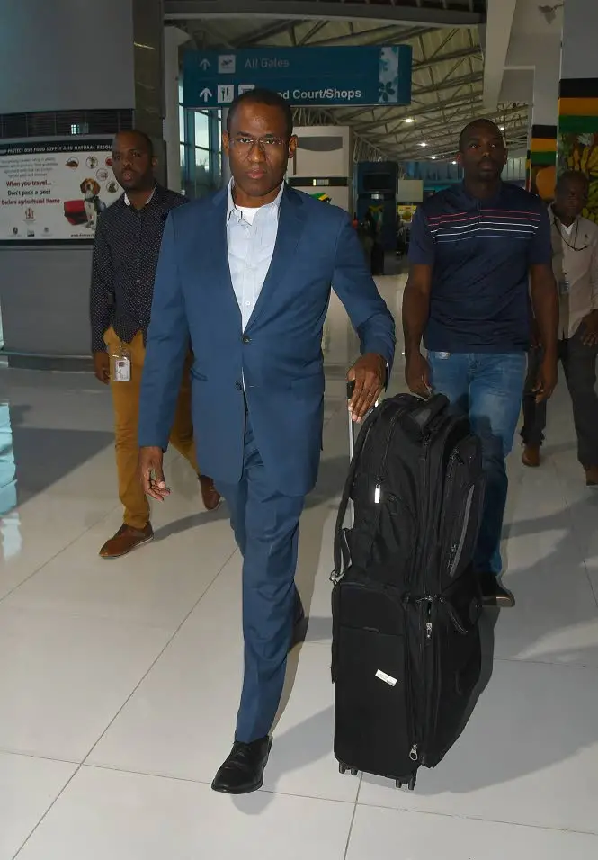 Former Minister of FInance and the Public Service Dr Nigel Clarke at the Norman Manley International Airport in Kingston on Wednesday, en route to Washington, DC, United States to take up his new job as deputy managing director of the International Monetary Fund.Photo: Garfield Robinson