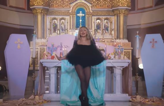 New York priest fired after Sabrina Carpenter filmed provocative music ...