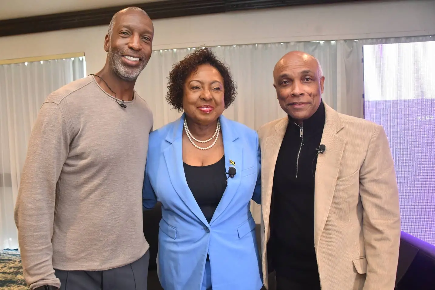 Founder Michael Johnson (left), Sport Minister Olivia Grange (centre), and Jamaica Olympic Association President Christopher Samuda during a Grand Slam Track series press conference in Kingston on Monday.Garfield Robinson