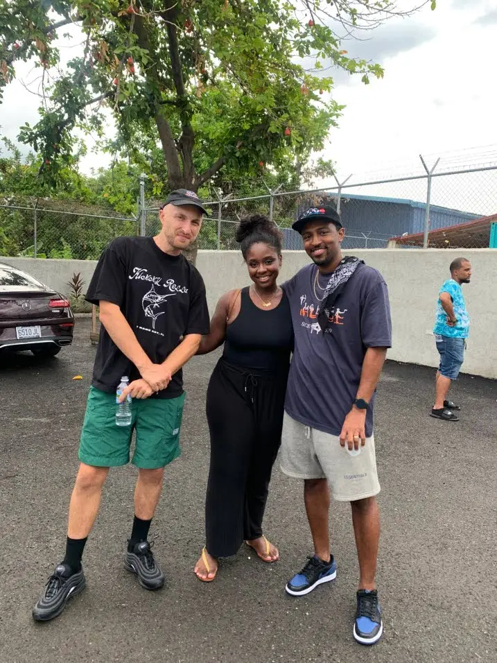 Co-Project Manger Cheraine Marshall poses with Sam Griesemer (left) and Tahir Garcia in-between an episode shoot in 2022..