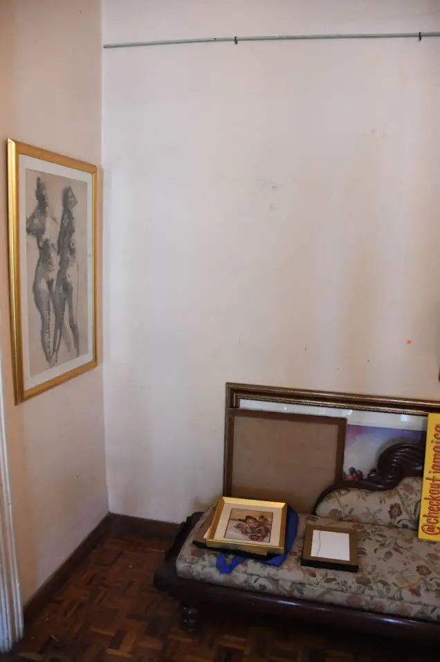 Another painting done by Barrington Watson was mounted on this spot in the house of his former wife before last Saturday evening’s heist.Photo: Joseph wellington