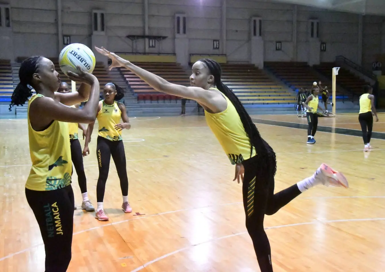 Jamaica’s Sunshine Girls player Shamera Sterling-Humphrey (right) blocks against Mischa Creary during a warm-up exercise at the National Indoor Sports Centre on Friday, October 11, 2024..