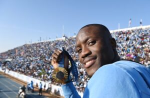 Flags and dancing as Botswana welcomes home Olympic hero